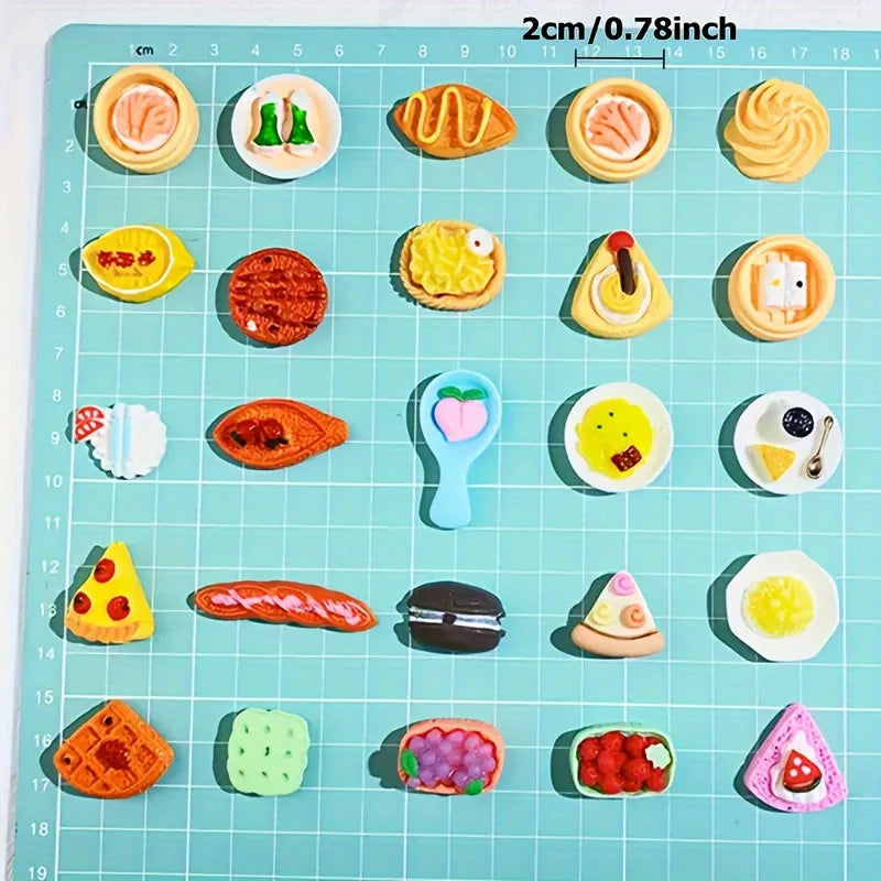 A grid of miniature food items including cakes, wine, and various snacks arranged on a light blue cutting board.