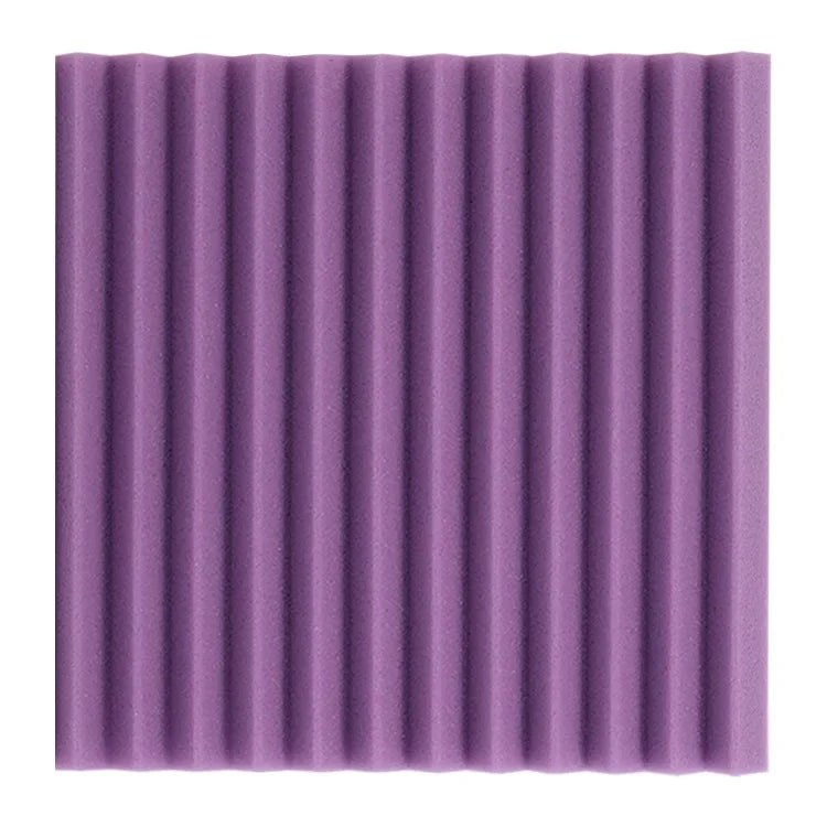 A rectangular panel of purple acoustic foam with vertical ribbed texture.