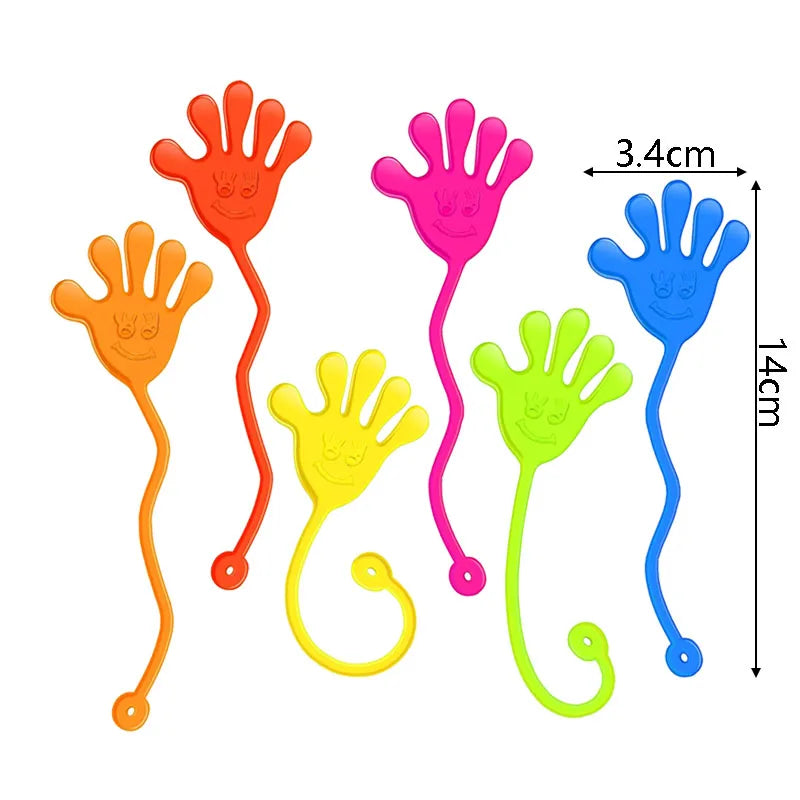 A set of colorful stretchy sticky hands and spider web party favor toys in various bright colors.