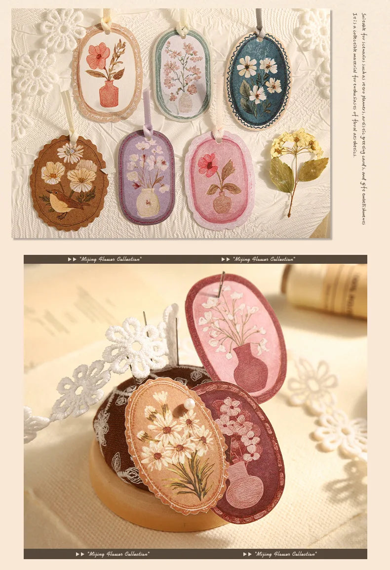 A collection of vintage floral stickers in various shades of pink, green, and purple on white paper.