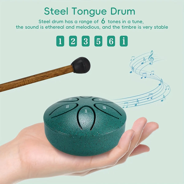 A hand holds a green steel tongue drum, with a wooden mallet and musical notes floating above it.