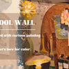 A wooden art studio wall filled with various painting tools and miniature works inspired by Monet.