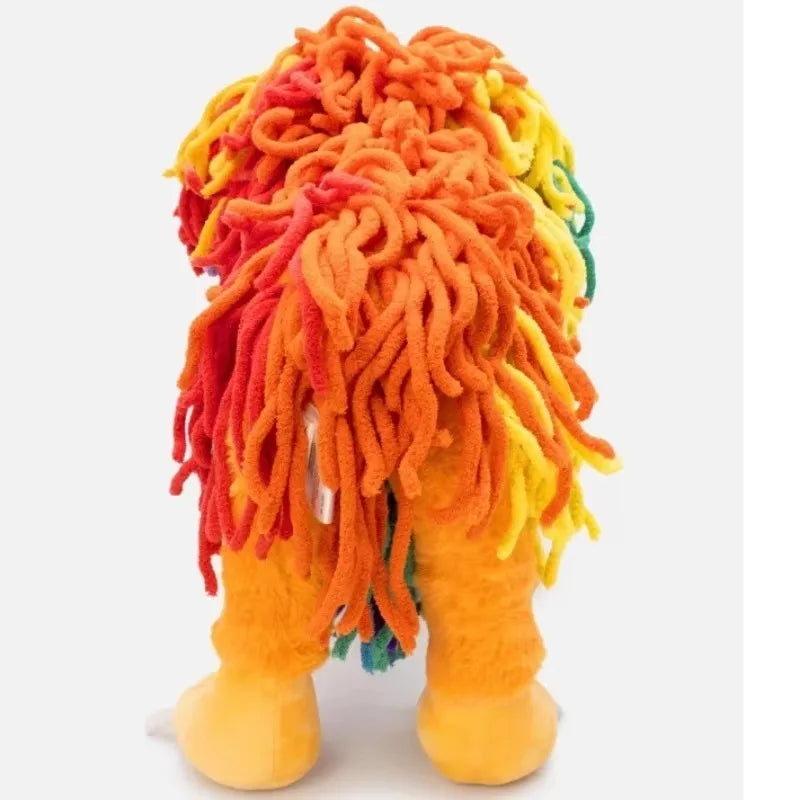 A colorful lion stuffed animal plush toy with shaggy orange, red, and yellow yarn hair.