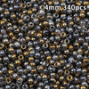 A close-up view of 340 golden gradient glass beads used for DIY jewelry making.