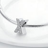 Sterling silver alphabet charm beads featuring an X design encrusted with cubic zirconia