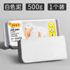 A package of white air dry clay modeling clay is shown next to a white block of the same clay.