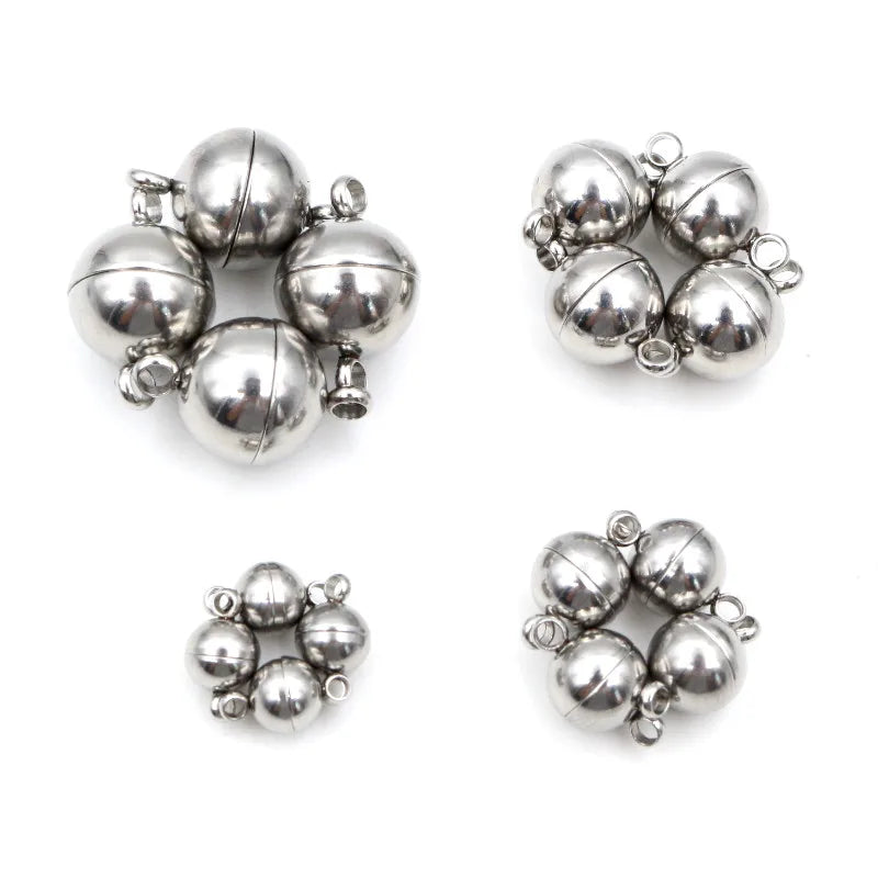 A set of silver stainless steel magnetic clasps for jewelry making, arranged in two groups.