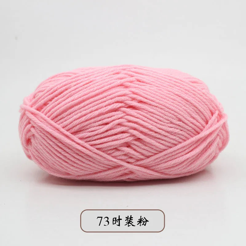 Pink pre-dyed milk cotton yarn in a ball for knitting and crochet