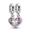 A silver heart charm bead featuring pink zircon stones and a 'love' engraving.