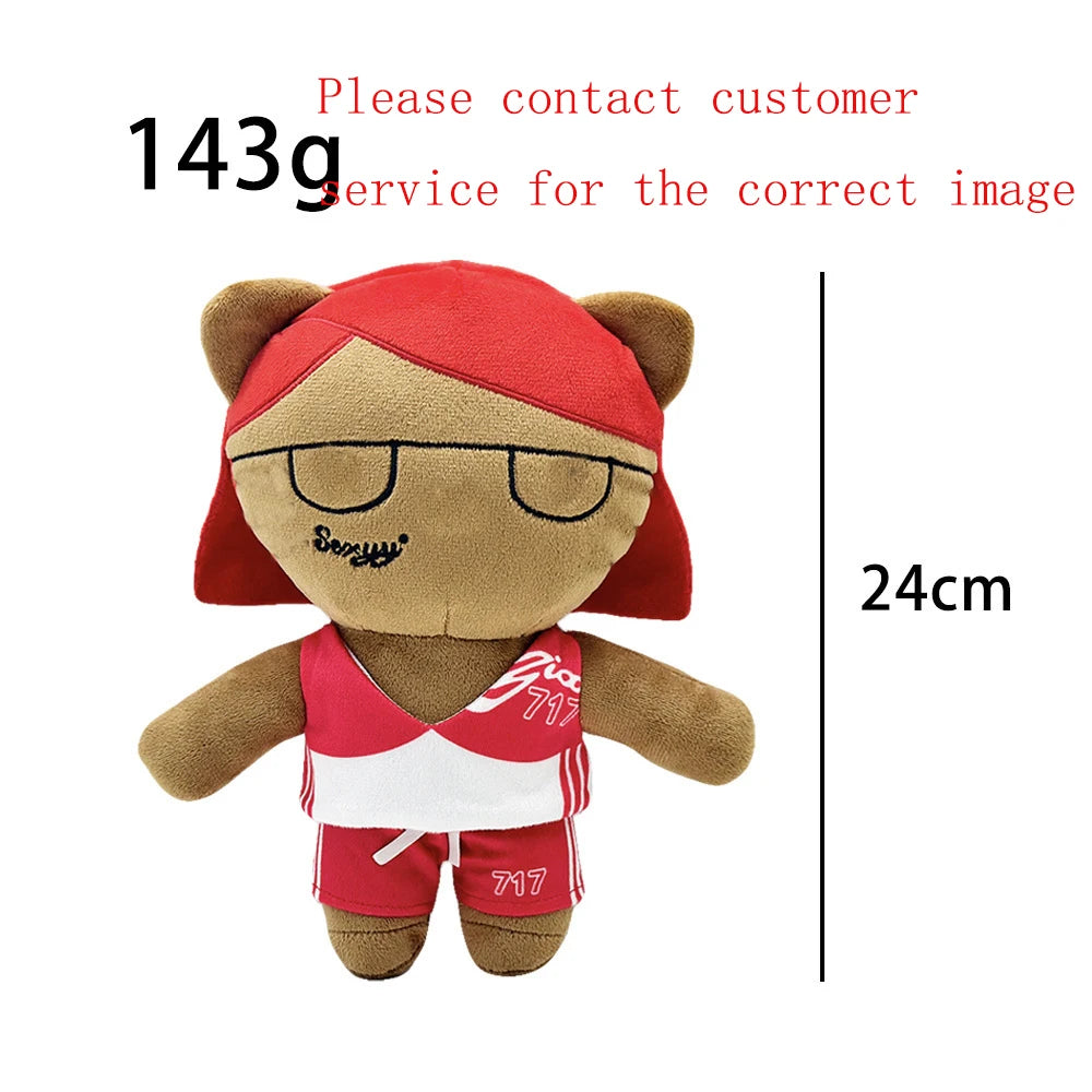 A plush doll resembling Eminem with red hair and glasses, wearing a red shirt and shorts.