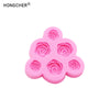 Pink silicone mold with multiple rose and peony shaped cavities for resin, jewelry, or baking.