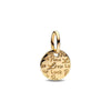Gold-toned charm bracelet featuring pendants of an elephant, key, butterfly, and heart.