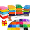A variety of colorful fuse beads and craft materials are displayed in various colors and shapes for pixel art puzzles.