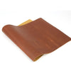 A roll of rust red crazy horse leather hide with an oily finish and a tan protective cover.