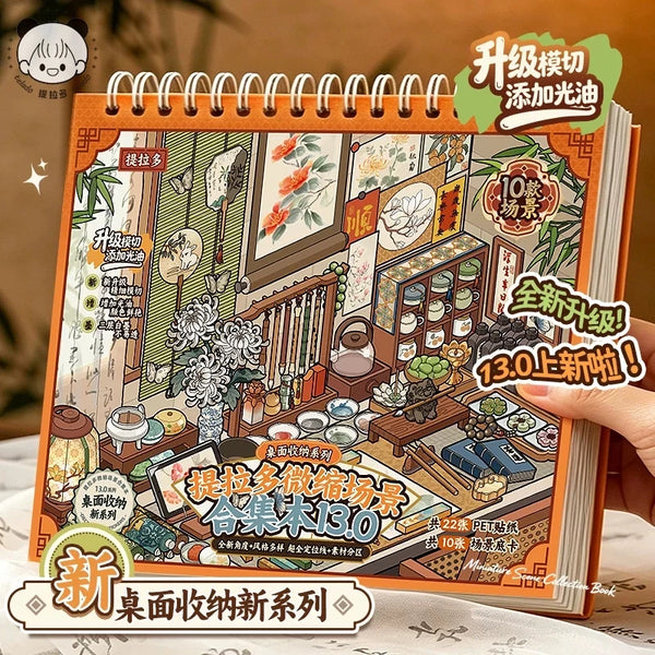 An orange spiral-bound scrapbook featuring a 10-in-1 desktop organizer and sticker set with nature and traditional elements.