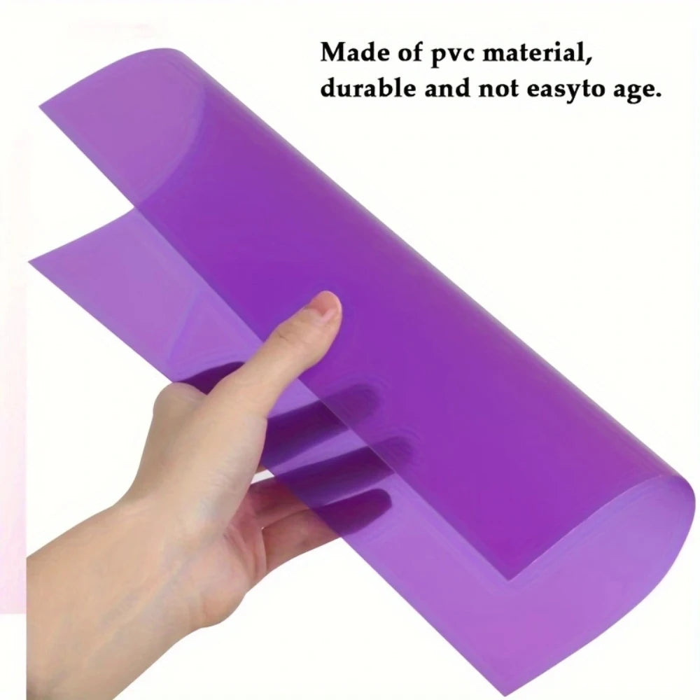 A hand is holding a purple, durable PVC sheet used for DIY crafts and modeling.