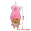 Pink fluffy bunny plush cartoon keychain charm with a small tag