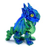 A vibrant blue and green articulated 3D printed dragon figurine used as a fidget toy or desk decor.