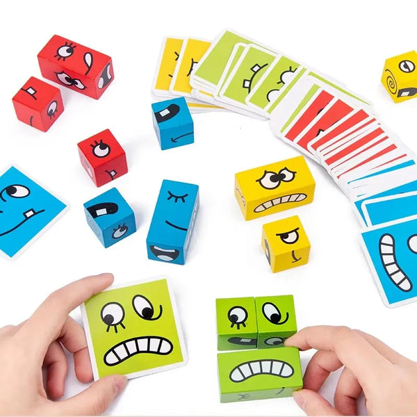 A collection of wooden expression matching blocks in various colors and shapes, some being held by a hand.