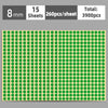 A sheet of round green self-adhesive dot labels with a light yellow background.