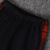 Black fleece-lined toddler boys two-piece set with red plaid trim