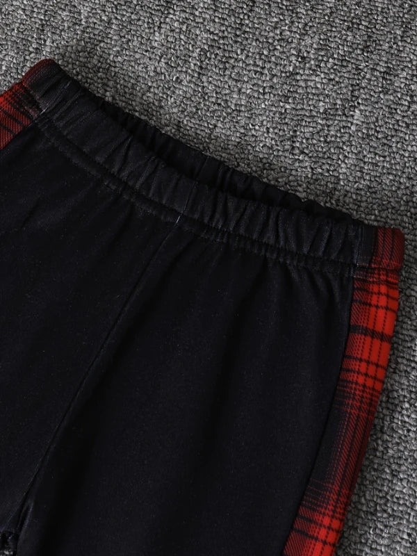 Black fleece-lined toddler boys two-piece set with red plaid trim
