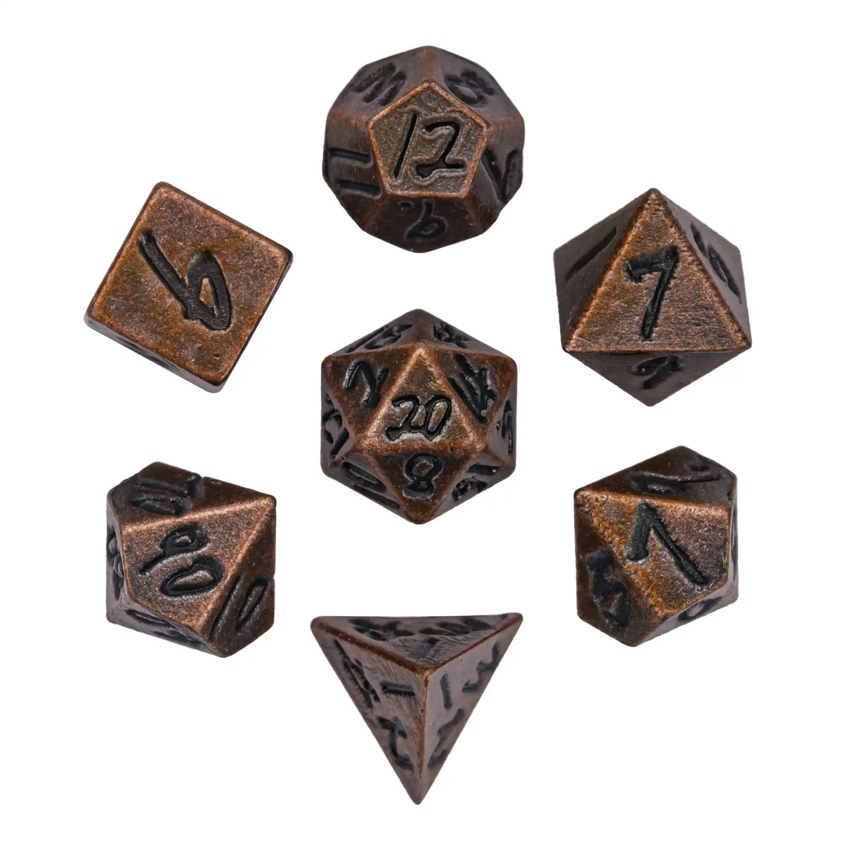 A set of small, dark bronze metal dice including a d6, d8, d10, and d12, along with a bullet box.