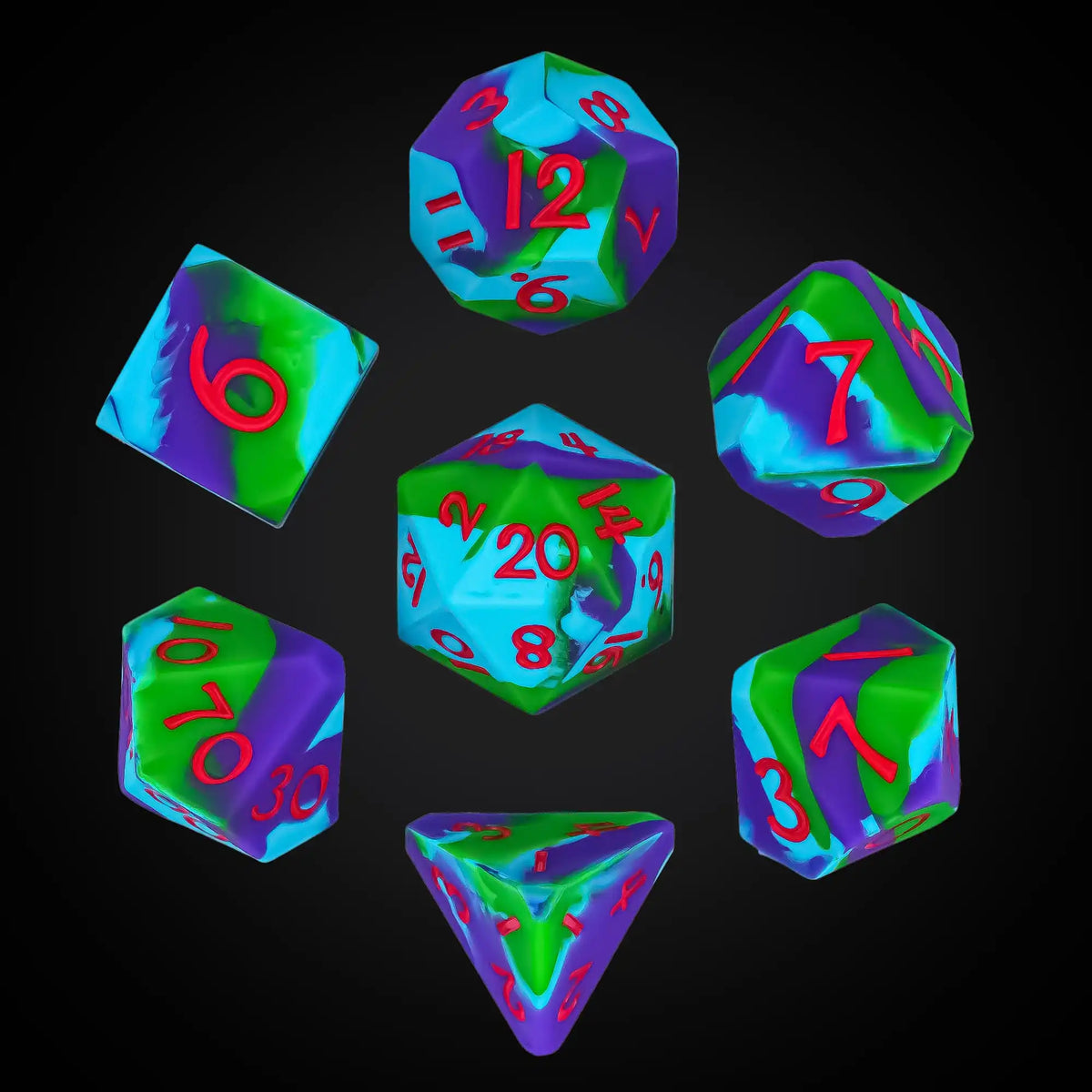 A collection of silicone polyhedral dice showing various numbers and colors against a dark background.