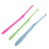 A pair of pink and light green orthodontic interdental brushes for cleaning teeth.