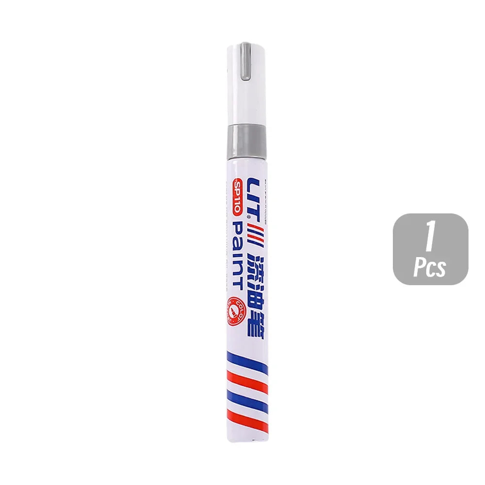 A single tube of permanent paint markers with a white and blue striped body and silver cap.