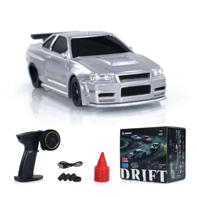 Silver mini RC drift car with 4WD and 2.4G remote control and accessories