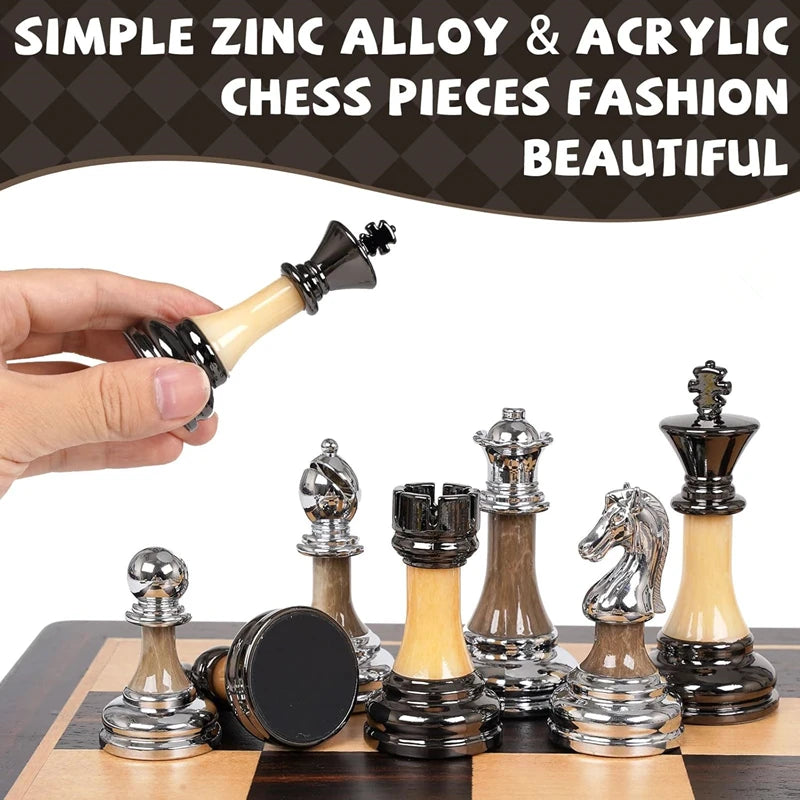 A hand holds a wooden chess piece, with various acrylic and metal chess pieces displayed on a wooden board.