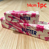A box of salted butter squishy stress relief toy in pink and white marbled design.