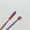 A close-up of a colorful stainless steel clay sculpting tool set featuring two elongated tools.