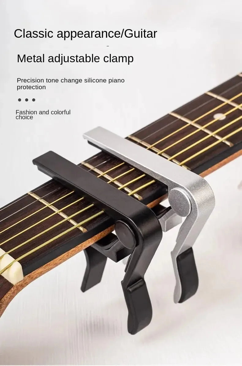 Metal adjustable clamp for guitar, used for precision tone change and piano protection.
