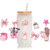 A clear glass cup with a cork stopper and various pink and white waterproof makeup-themed decorative wraps.