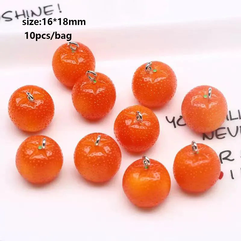 A collection of small, round, orange-colored charms or beads for jewelry making.