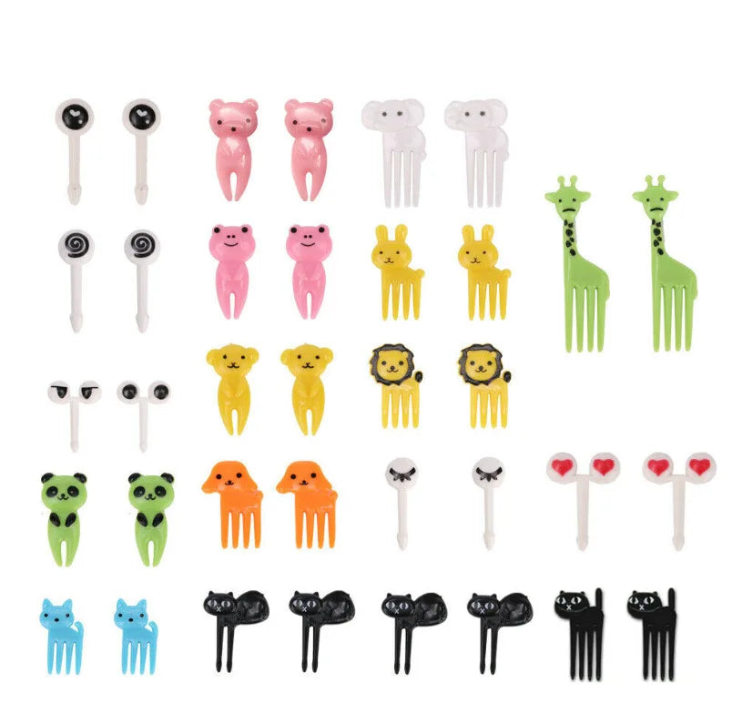 A collection of mini fruit shaped forks in various colors and designs for children