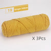 A skein of 19 Ginger Yellow soft cotton blend yarn for knitting and crochet, packaged as a 3-pack.