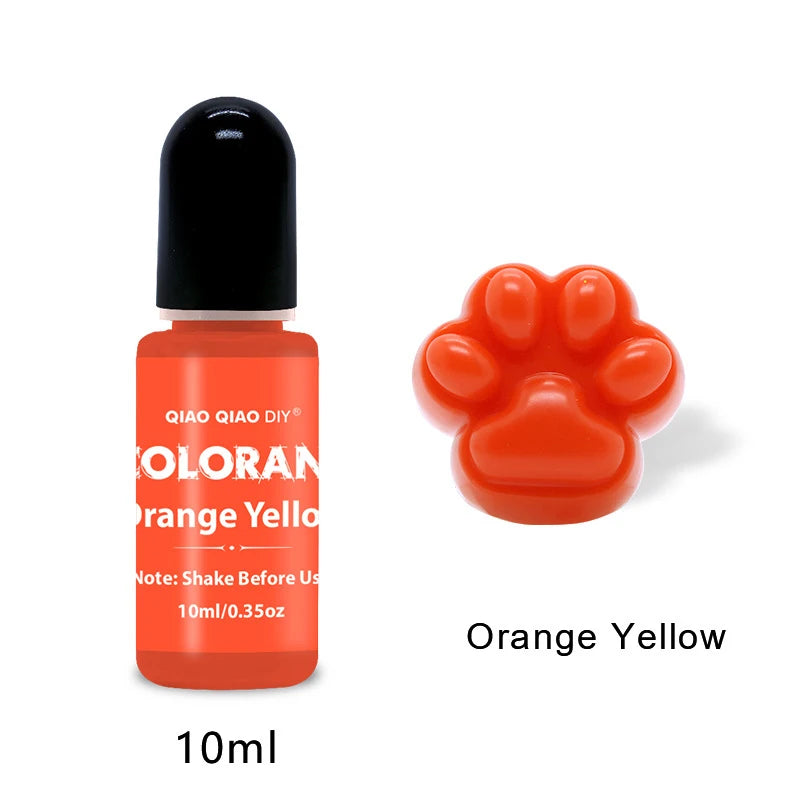 A small orange yellow liquid pigment bottle with a black cap labeled Orange Yellow for candle and soap making.