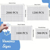 Various sizes of jigsaw puzzles showing different piece counts including 2000 PCS, 1200 PCS, 1000 PCS, and 500 PCS