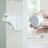 A hand holds a white magnetic safety lock, demonstrating a punch-free installation method.