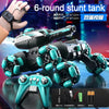 A black and teal RC stunt tank is shown with its wheels and controls, next to a controller and battery components.