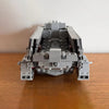 A detailed model of an Imperial Troop Transport building constructed from gray plastic blocks.