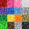 A collection of solid color pony beads in various shades including red, pink, purple, blue, green, yellow, orange, and gold.