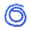 A circular arrangement of bright blue faceted crystal beads forming the shape of a six.