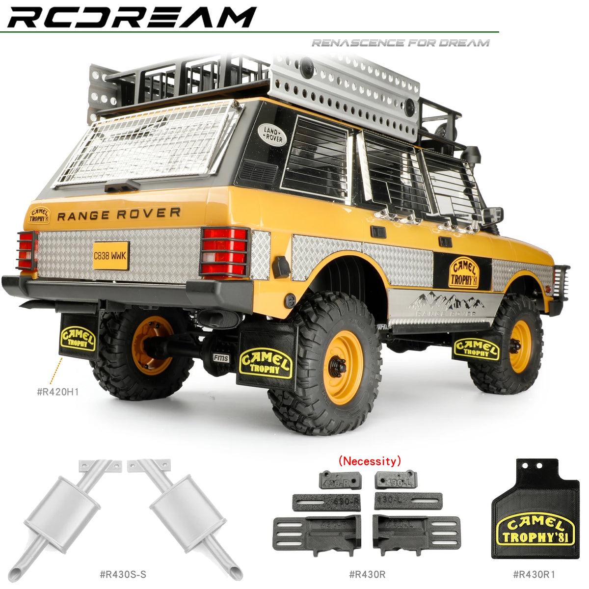 A yellow RC Range Rover model with accessories like mud flaps, fuel tank, and exhaust mufflers.