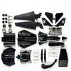 A collection of black military fighter jet building blocks, including models resembling the F14 Tomcat, SU57, and SU35.