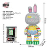 A small bear figure made of micro building blocks in various colors and patterns.