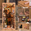 A wooden DIY kit for a Japanese alley miniature scene featuring detailed architecture and touch switches.